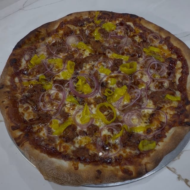 Pizza Of The Month Chef Special.
