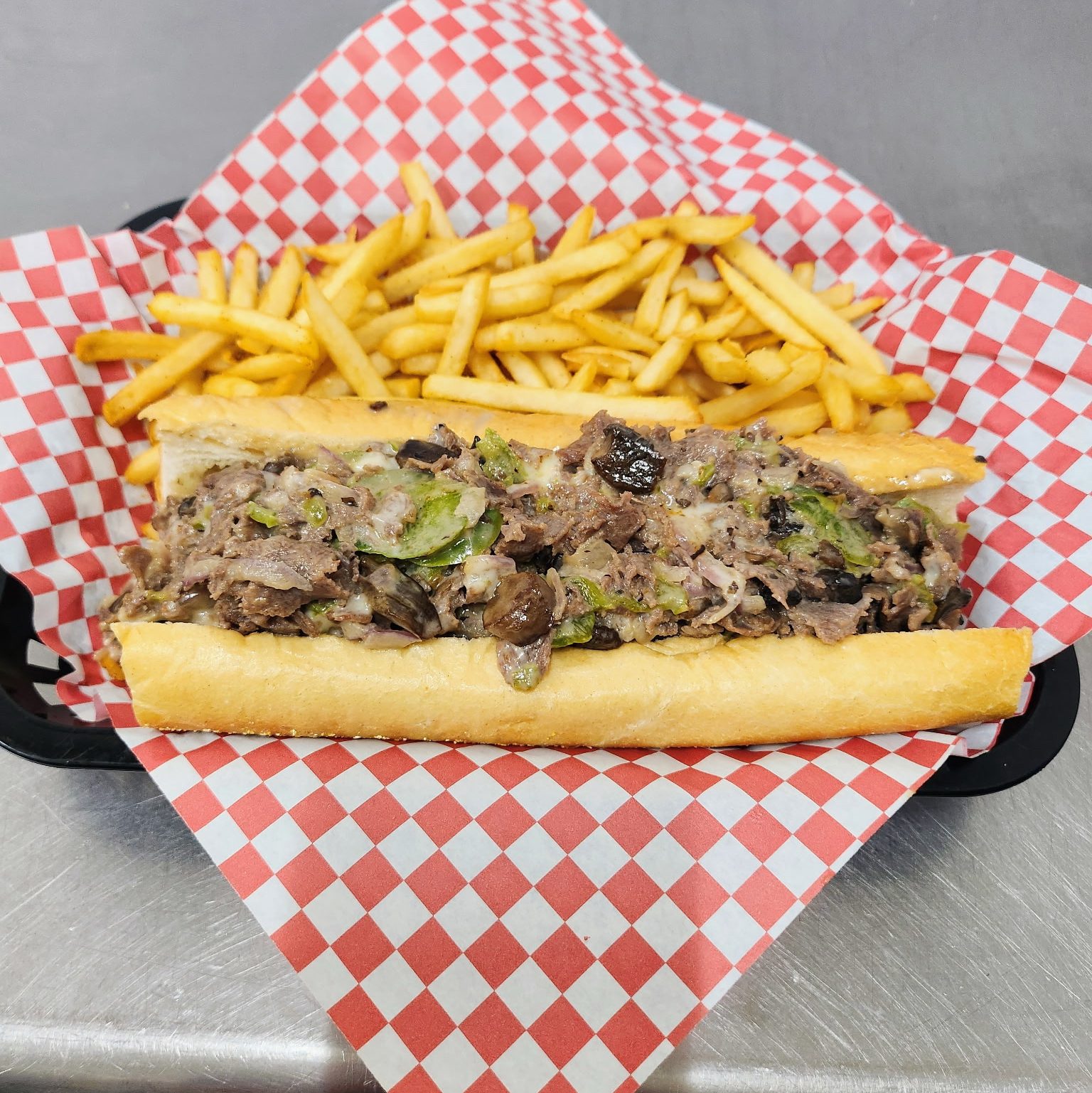 Loaded Philly Cheesesteak With Fries..