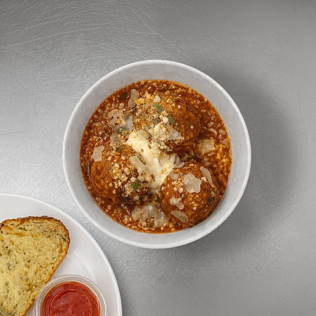Nonna's Meatballs with Garlic Bread.